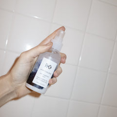 R+Co Spiritualized Dry Shampoo Mist being used after a workout for fresh hair.