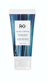 R+Co Velvet Curtain Balm bottle showing soft volume and light hold.