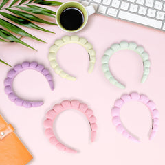RAISEY spa headband worn during skincare routine