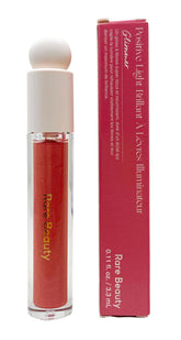 Rare Beauty Glimmer lip gloss application shows cushiony shine and hydrated glow.