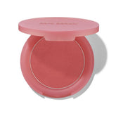 Rare Beauty Soft Pinch blush Happy swirls on cheeks for a natural, lasting flush.