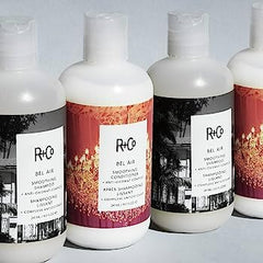 R+Co Bel Air smoothing conditioner bottle adds body and gloss