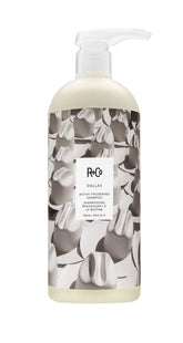 R+Co Dallas thickening shampoo bottle shows premium design for volumizing hair vitality
