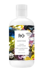 R+Co Gemstone Color Conditioner bottle close-up highlighting color-safe hydration.