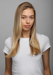 R+Co Hot Spell balm applied to damp hair ready for blow dry smoothing