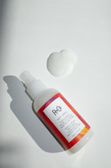 R+Co Hot Spell balm texture close up shows silky cream for even application