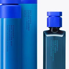 R+Co Hypersonic Heat Styling Mist applying to hair during styling for protection.