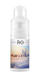 R+Co Skyline dry shampoo bottle demonstrating oil absorption and root lift.