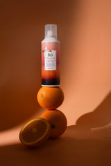 R+Co SUN CATCHER finished hair with shine and bounce after spray.