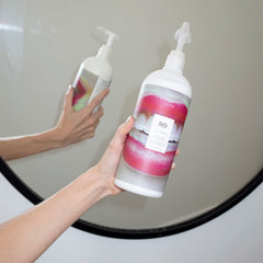 R+Co Television Perfect Hair Conditioner pump demonstrates easy application for smooth, frizz-controlled hair.