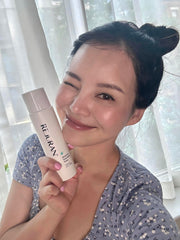 REJURAN Moisture Treatment Toner application swipe showing quick absorption and refreshing feel.