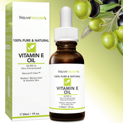 RejuveNaturals Vitamin E Oil being applied in drops to skin for hydration