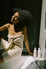 REVERIE sustainability label close-up communicates cruelty-free packaging.
