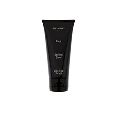 REVERIE Natural Rake Styling Balm bottle closeup for nourishing shine and lightweight hold.