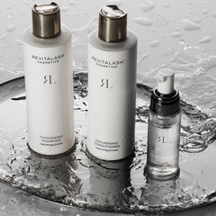 RevitaLash bottle beside common object illustrating size and travel-friendly benefit