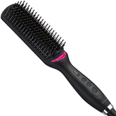 Revlon Salon One-Step Straight & Shine brush closeup shows sleek styling and frizz control
