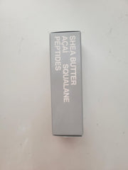 Rhode Barrier Restore Cream packaging on white backdrop reflects premium skincare.