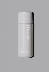 Rhode Glazing Milk bottle pour demonstrates lightweight hydration for radiant skin.
