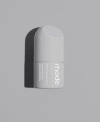Rhode peptide glazing fluid bottle closeup in white packaging for luminous skin