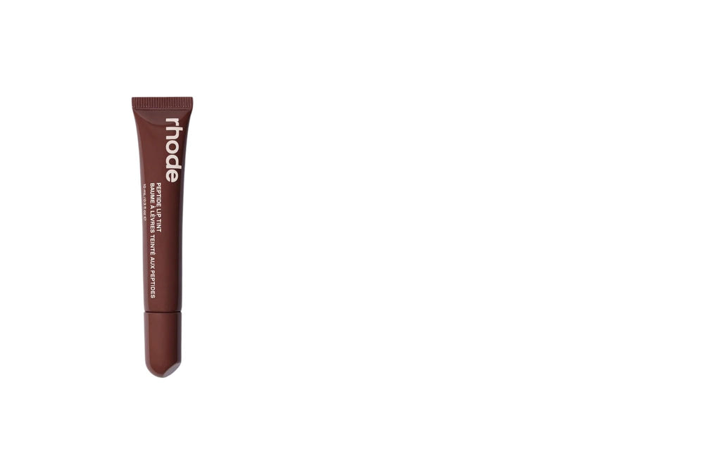 Rhode Peptide Lip Tint Espresso close-up shows a sheer tint for natural lip glow.