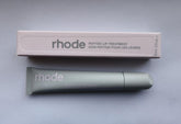 Rhode Watermelon Slice Lip Treatment tube delivering nourishing hydration for soft, glossy lips.