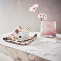 RITUALS Ritual of Sakura Body Scrub jar closeup highlights creamy texture for silky-soft skin