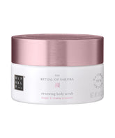 RITUALS Ritual of Sakura Body Scrub packshot shows the jar on a calming surface for glowing skin