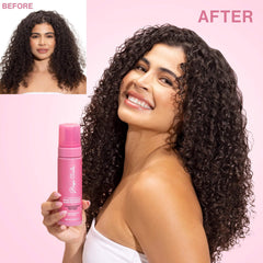 Rizos Curls Curl Defining Mousse dispensing action highlights non-aerosol use