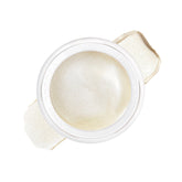 RMS Beauty Luminizer on cheekbones for natural radiance and dewy glow.