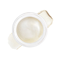 RMS Beauty Luminizer on cheekbones for natural radiance and dewy glow.