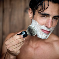 Rocky Mountain Barber brush and stand demonstrate organized grooming storage.