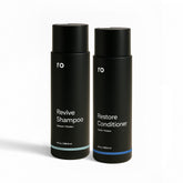 ROMAN Ro Revive Shampoo bottle with mint clarifying formula for thicker-looking hair