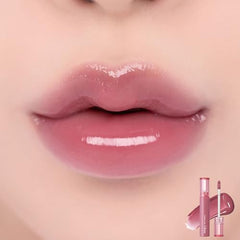 rom&nd Glasting Color Gloss 04 Grapy Way lip swatch reveals buildable pink tint.
