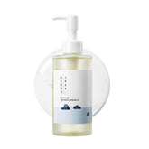 ROUND LAB 1025 Dokdo cleansing oil bottle for makeup removal and gentle cleanse.