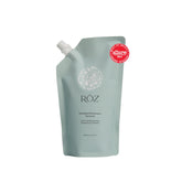 RŌZ Foundation Shampoo refill bottle pour demonstrates easy, waste-reducing daily cleansing.
