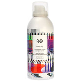 R+Co ANALOG bottle pour shows weightless conditioning and frizz control