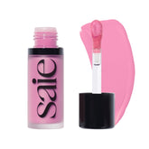 Saie Dew Liquid Blush applicator applies a natural flush for everyday glow.