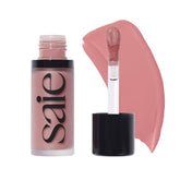 Saie Dew Liquid Blush bottle closeup shows creamy hydrating formula for a natural glow