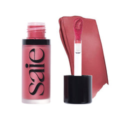 Saie Dew Liquid Blush packaging on a clean vanity, showcasing modern vegan design.