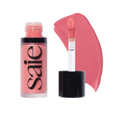 Saie Dew Liquid Blush Sweetie wand application delivers a buildable natural glow.