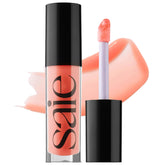 Saie Glossybounce front packaging showing tube and shade name, convenient travel size benefit