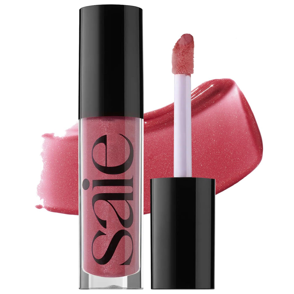 Saie Glossybounce lip gloss wand application delivering precise, non-sticky shine.