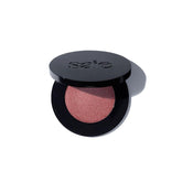 Saie compact front view showing Mauveglow shade and sleek packaging benefit portability