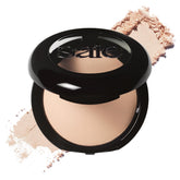 Saie Slip Tint front packaging showing compact and logo, conveys portability benefit