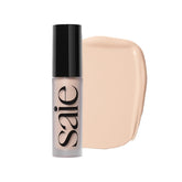 Saie Slip Tint Radiant Concealer compact closeup shows creamy coverage for undetectable redness
