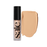 Saie Slip Tint under-eye application demonstrates hydrating, medium-coverage radiance.