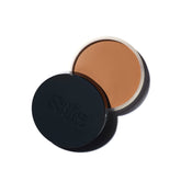 Saie Sun Melt cream bronzer swirl on cheek for natural bronze glow