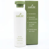 SALEE Hair Styling Cream bottle pour for smooth, frizz-free results.