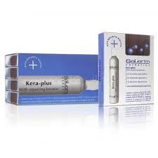 Salerm Kera-Plus repairing keratin bottle provides heat protection before styling.