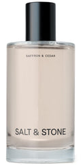 Salt & Stone Body Mist bottle-front showcases saffron cedar scent for all-day freshness.
